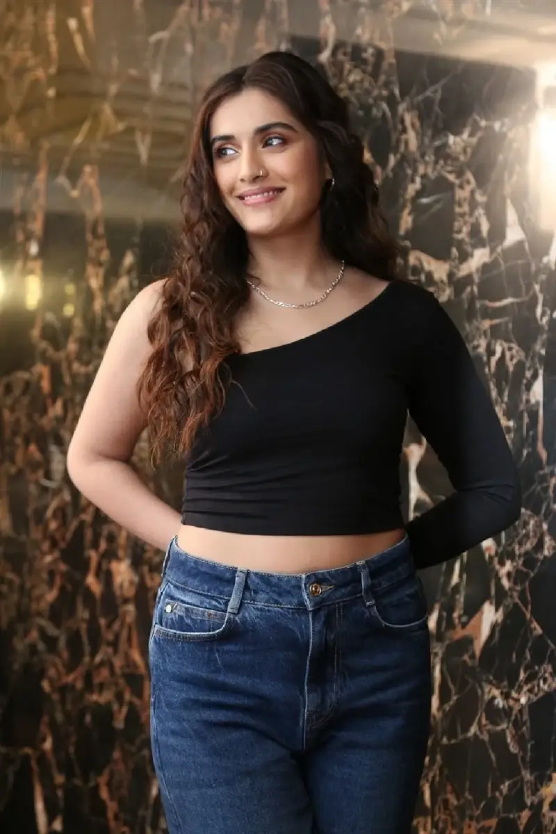 Actress Divyansha Kaushik in Black Dress at Michael Movie Press Meet